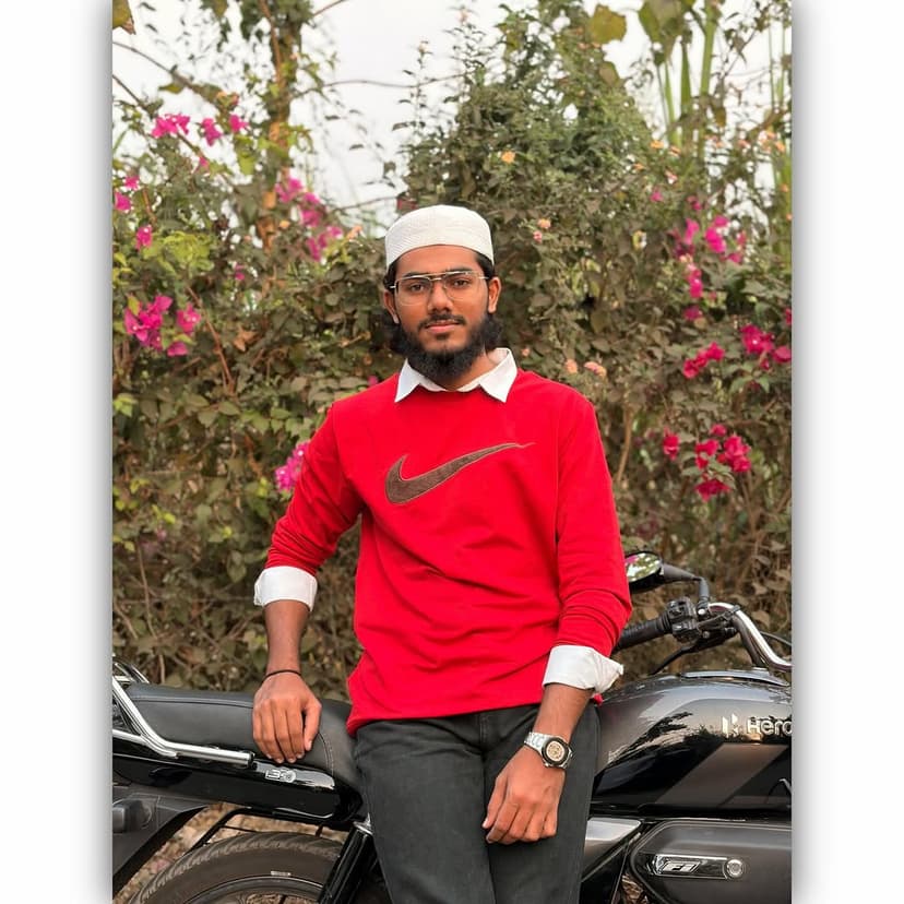 Umer Saiyad, Full Stack Developer from Surat, wearing a red sweatshirt ...