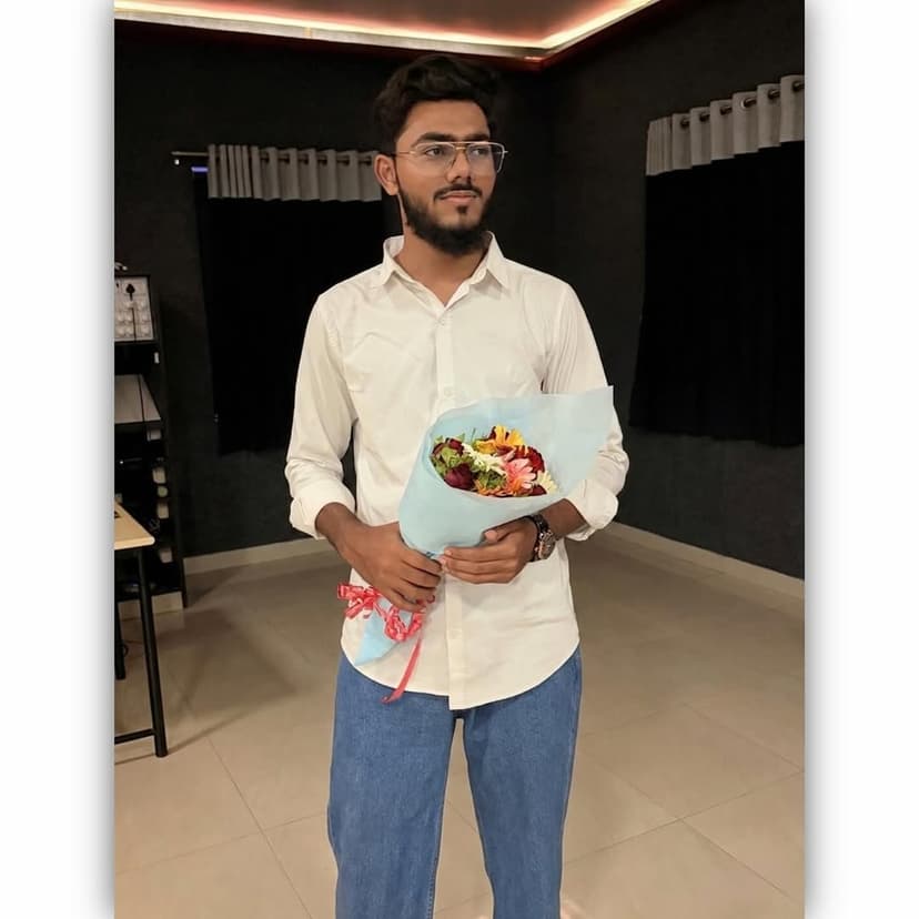 Umer Saiyad, Full Stack Developer from Surat, holding a flower bouquet ...
